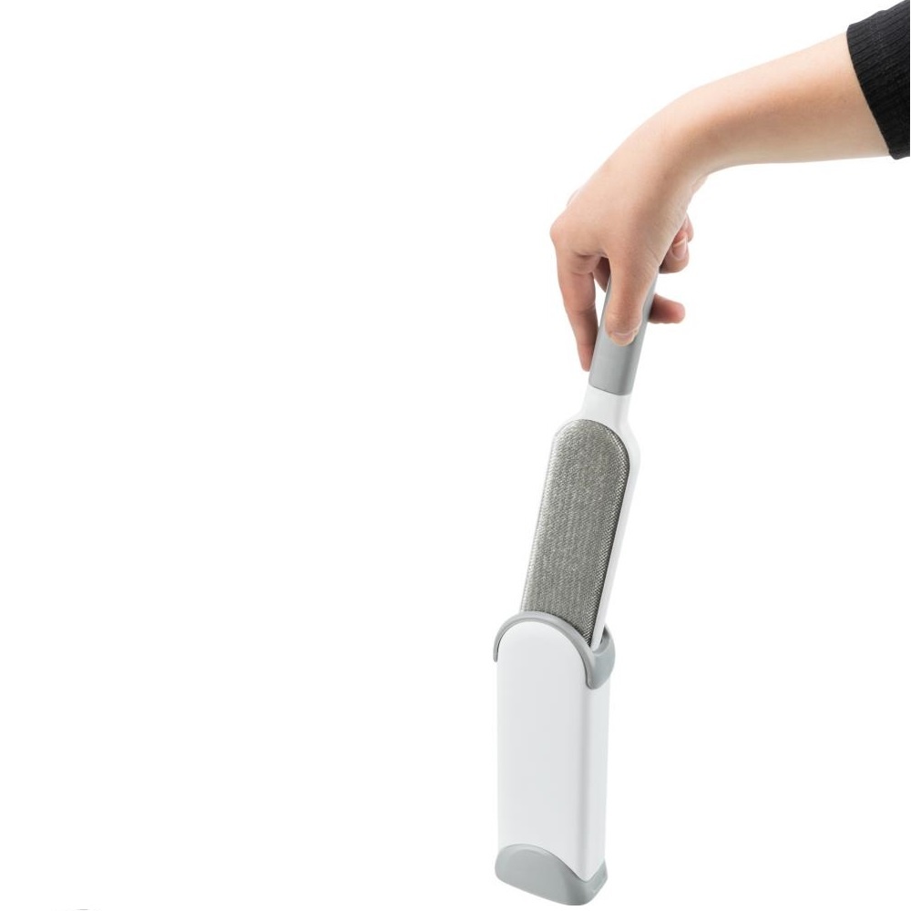 Hårfjerningsbørste med rengjøringsholder